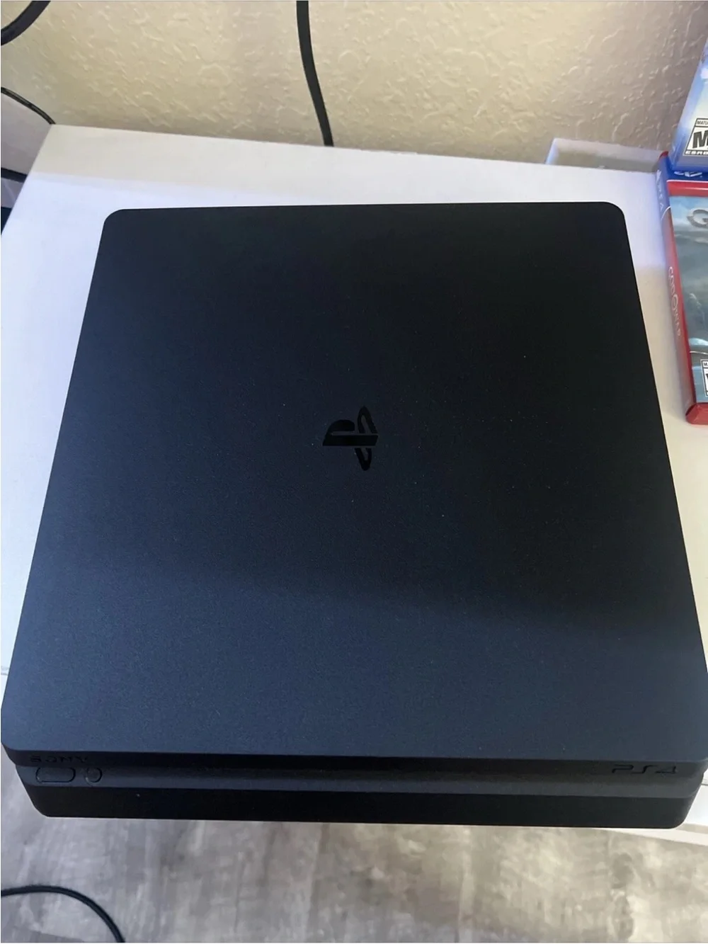 Sony Play S 4 Slim 500GB Gaming Console with 2 Controllers,15 Games, And Charger